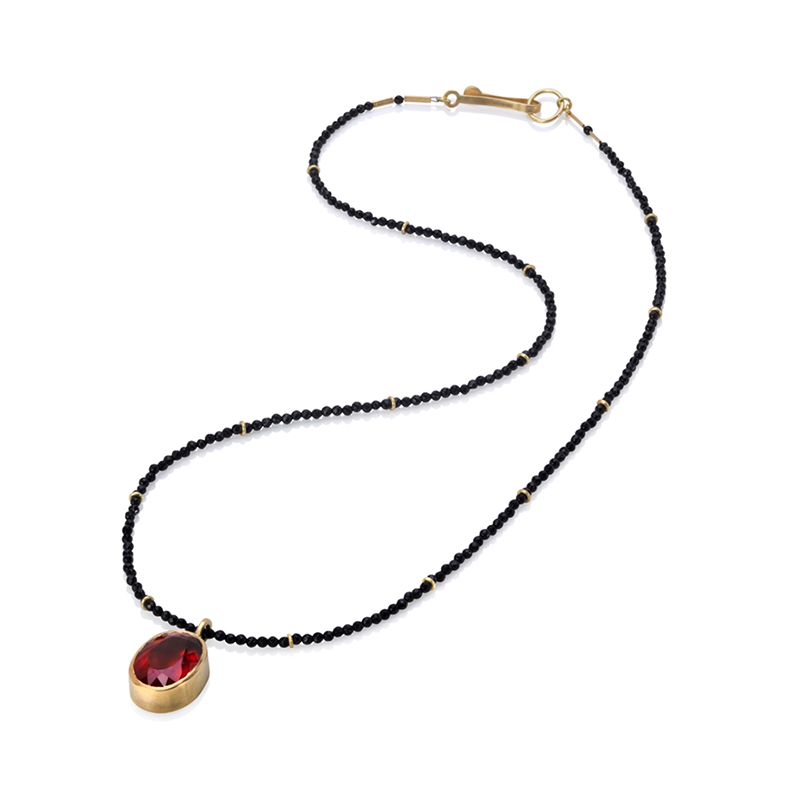 Rio Grande oval citrine on a necklace of small faceted black spinel beads